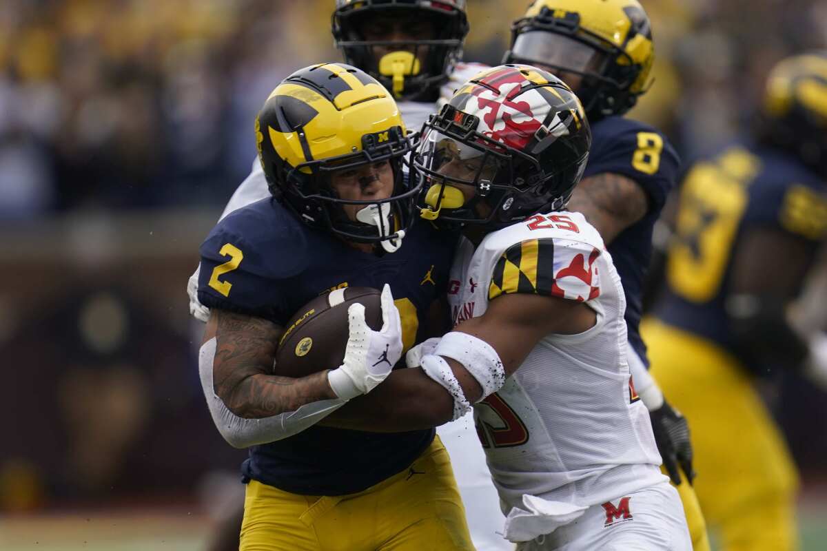 Corum s 243 yards 2 TDs lead No. 4 Michigan past Maryland The